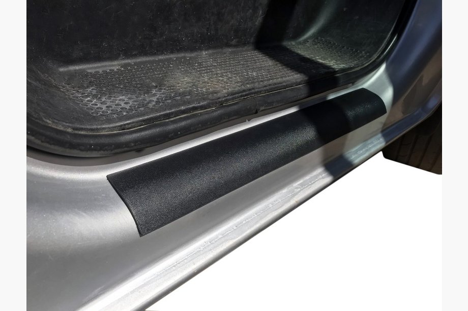Opel Vivaro 2001–2015 Dørtrinslister i ABS (2 stk., DDU) Blank Image