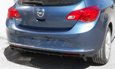 Opel Astra J 2009–2015 Cover til bagdiffuser (til lakering) foto 1
