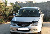 Mazda 323 1977–2003 Motorhjelmsdeflektor (VIP) foto 1