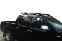 Nissan Navara 2006–2015 Tagrælinger med tværstænger (2 stk., krom) foto 2