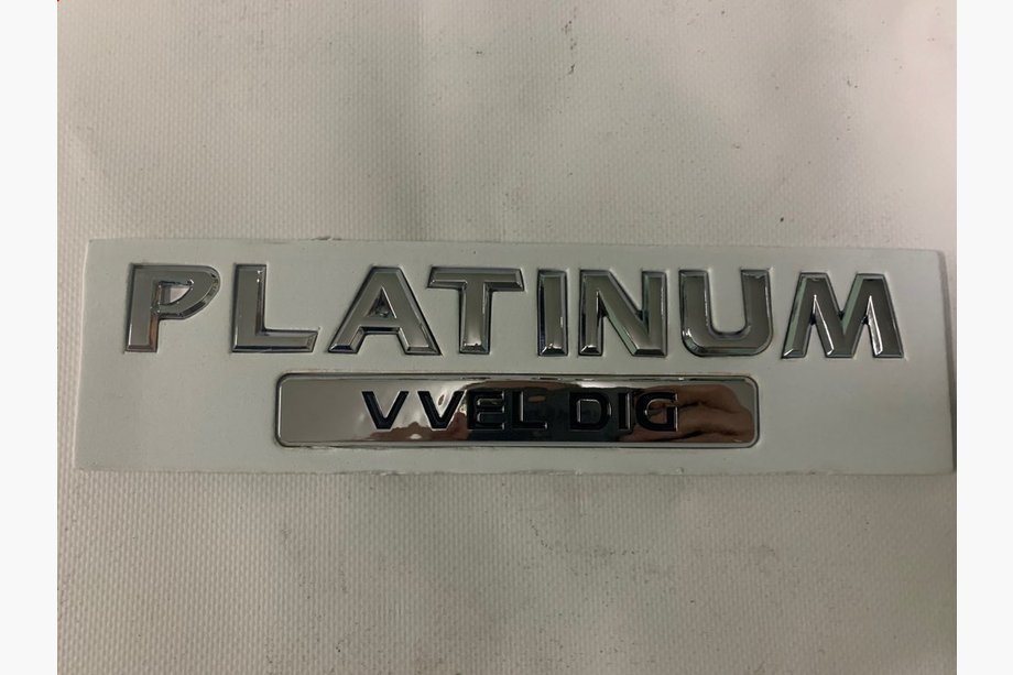 Nissan Patrol Y62 2010–2024 Platinum emblem Image