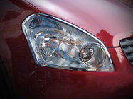 Nissan Qashqai 2007–2010 Krom forlygterammer (2 stk., plast) foto 1