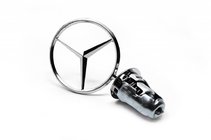 Mercedes W123 1975–1986 Korssigte-emblem foto 1