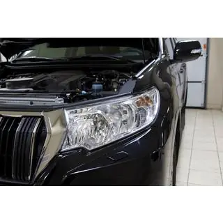Forlygteøjenlåg (førerside, til reflektorforlygte) Toyota Land Cruiser Prado 150 2009–2023 foto 1