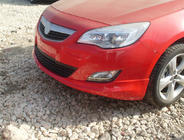 Opel Astra J 2009–2015 Front læbespoiler nederst 2010-2012 (klar til lakering) foto 1