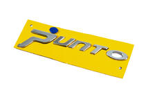 Fiat Punto Grande/EVO 2006–2018 Punto emblem til Grande (blå prik, 1518a) foto 2