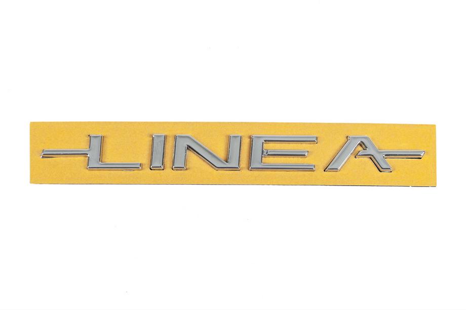 Fiat Linea 2006–2018 Linea modelbetegnelse emblem 51767266 (180 mm x 16 mm) Image