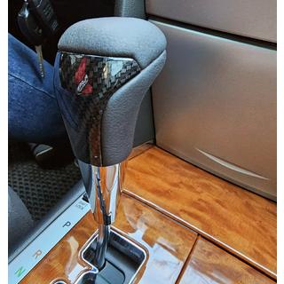 Gearknop (sort læder + carbon) Toyota Land Cruiser 200 2007–2021 foto 1