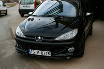 Peugeot 206 1998–2024 Front nederste spoilerlæbe (til lakering) foto 1