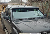 Nissan Navara 2006–2015 Forrudevisir (på ramme) foto 1