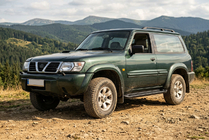 Nissan Patrol Y61 1997–2011 Allmond Black sidetrin (2 stk., aluminium) foto 1