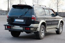 Mitsubishi Pajero Sport 1996–2007 Bageste beskyttelsesbøjle AK-Special Black (rustfrit stål) foto 3