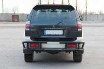 Mitsubishi Pajero Sport 1996–2007 Bageste beskyttelsesbøjle AK-Special Black (rustfrit stål) foto 4