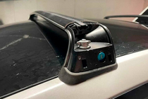 Tesla Model 3 2017– Tagbøjler til originale monteringspunkter, låsbare OEM (2 stk.) foto 8