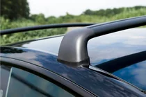 Tesla Model Y 2020– Tagbøjler til originale monteringspunkter, låsbare OEM (2 stk.) foto 1