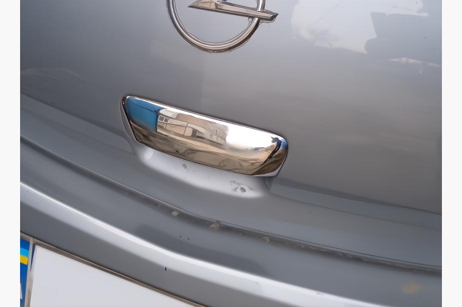 Opel Corsa D 2007–2014 Dæksel til bagdørshåndtag (rustfrit stål) OmsaLine - italiensk rustfrit stål Image