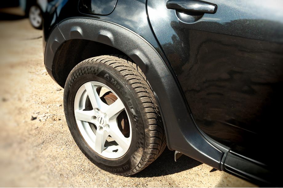 Dacia Duster 2008–2018 Hjulkassekanter med fremspring (8 stk., plast) Image