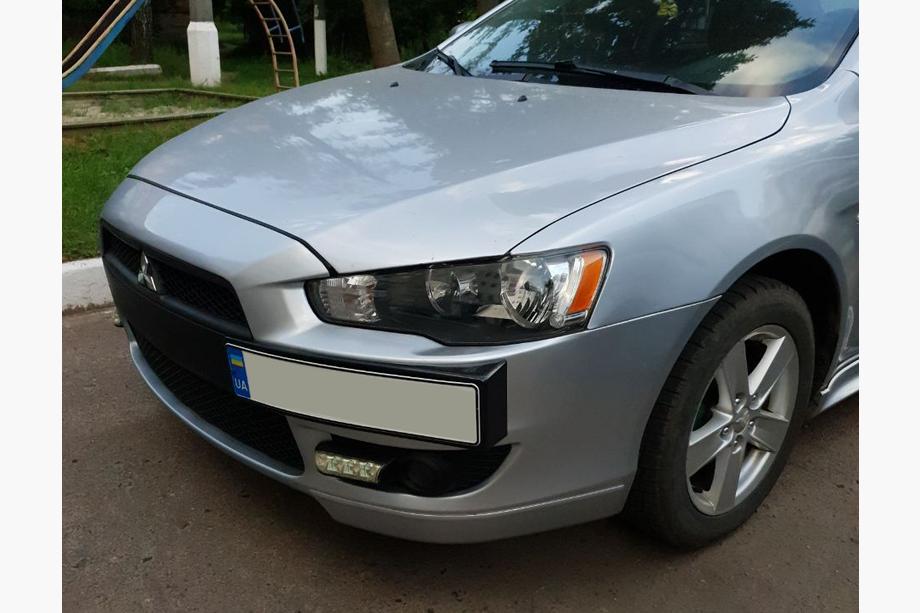 Mitsubishi Lancer X 2008– Nummerpladeholder (plast) Image