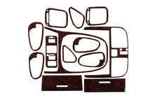 Mitsubishi Carisma 1995–2004 Instrumentbordbeklaedning (1999-2003) Carbon-look foto 1
