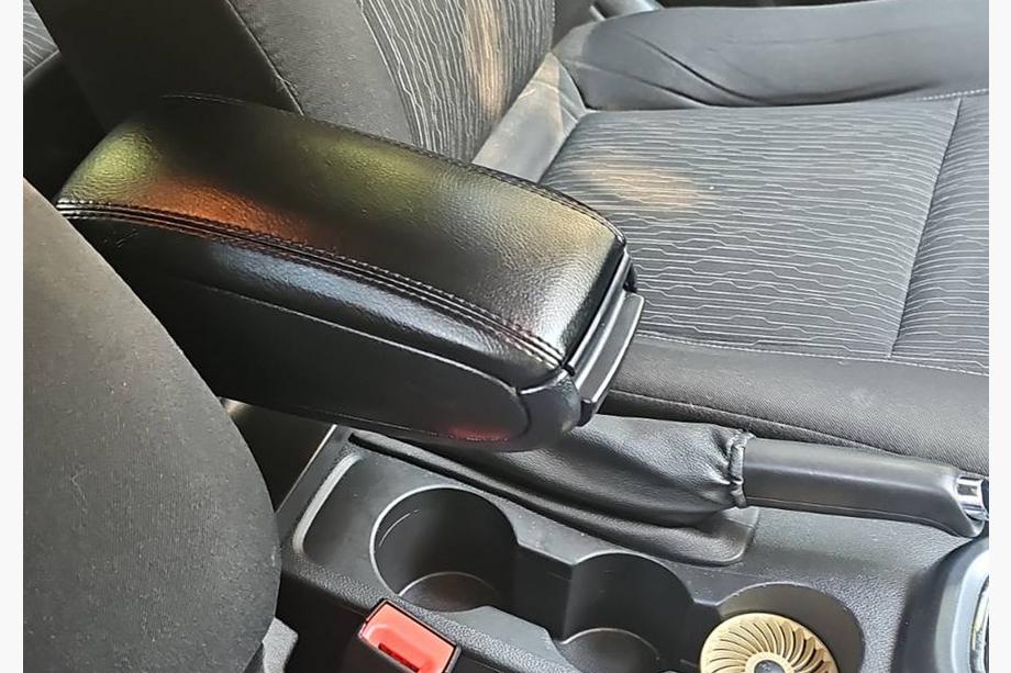 Opel Astra J 2009–2015 Armlæn til kopholder Foto 1