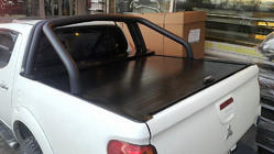 Mitsubishi L200 2006–2015 Rulleskodder foto 2