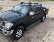 Nissan Navara 2006–2015 Tagrælinger med tværstænger (2 stk., krom) foto 1