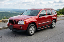 Jeep Grand Cherokee WK 2004–2010 Sidetrin Maya Red (2 stk., aluminium) foto 1