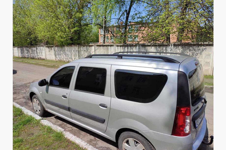 Lada Largus 2012– Sorte tagrælinger Image