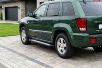Jeep Grand Cherokee WK 2004–2010 Sidetrin New Vision Black (2 stk., aluminium) foto 1