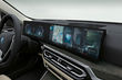 Første generation af den elektriske liftback BMW i4 foto 11