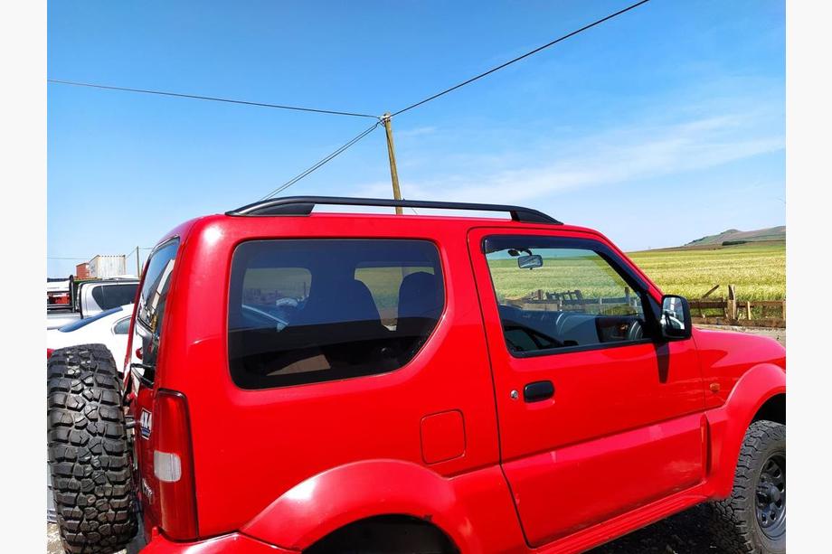 Suzuki Jimny 1998–2018 Tagrælinger Skyport (sorte) Image