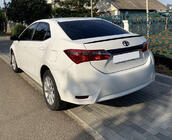 Toyota Corolla 2013–2019 LIP-spoiler (Sunplex, sort) (118 cm * 6,4 cm) foto 1