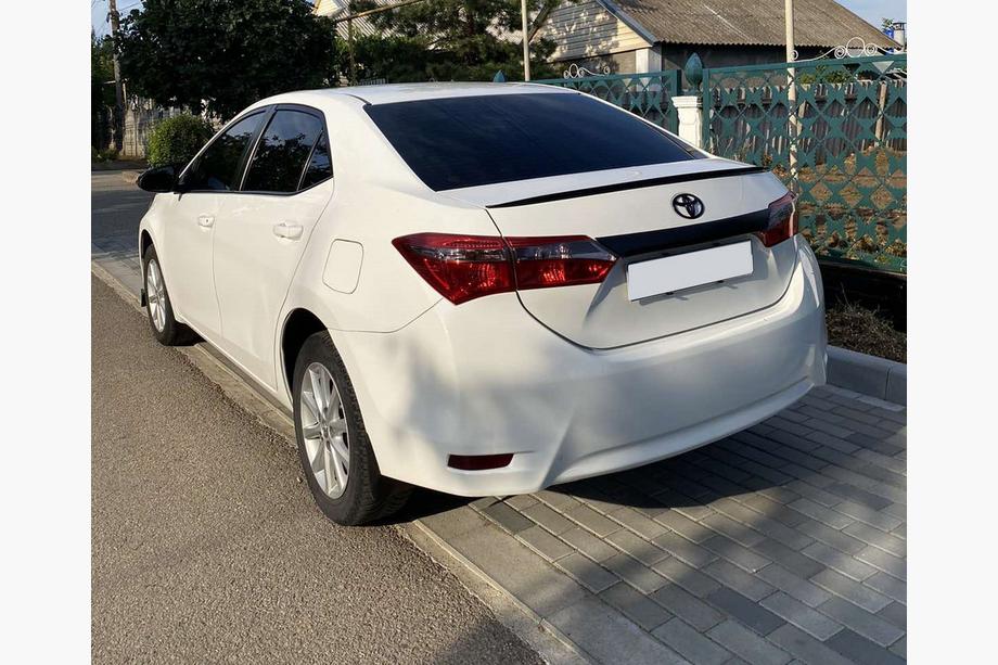 Toyota Corolla 2013–2019 LIP-spoiler (Sunplex, sort) (118 cm * 6,4 cm) Image