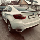 BMW X6 E71 2008–2014 LIP-spoiler (1234 Upgrade, sort) foto 2
