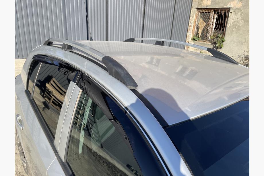 Opel Astra H 2004–2013 Tagrælinger i aluminium (HB, krom) Foto 12