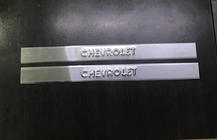 Chevrolet Lacetti 2003–2024 NEDSAT! Carmos dørtrinslister (2 stk., rustfrit stål) foto 1
